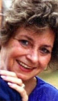 Photo of Judith Pittman, her face smiling.