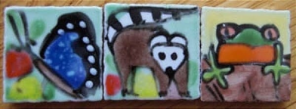 Image of 3 tiles hand painted with rainforest animals.