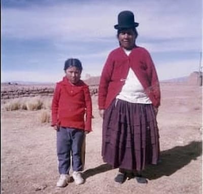 Photo of ChildFund sponsored girl child and her grandmother in highlandes of Bolivia